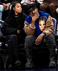 Kanye West and Vinetria courtside